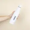 Botella de acero inoxidable 750ml color blanco modelo mano