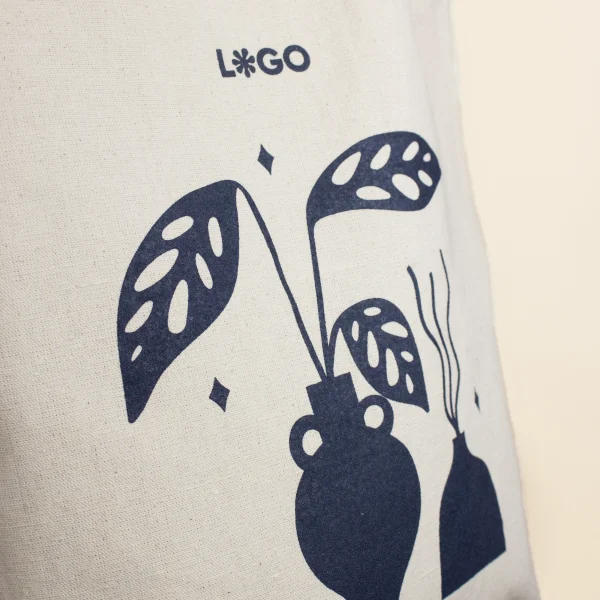 Bolsas de algodón personalizadas con detalle logo azul
