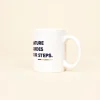 Taza Blanca personalizada con logo azul lateral sobre fondo beige