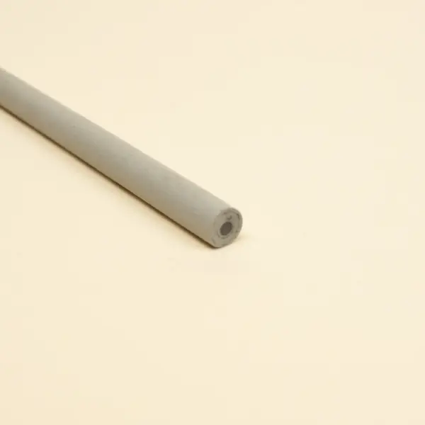 Lápiz de papel reciclado cuerpo fondo beige