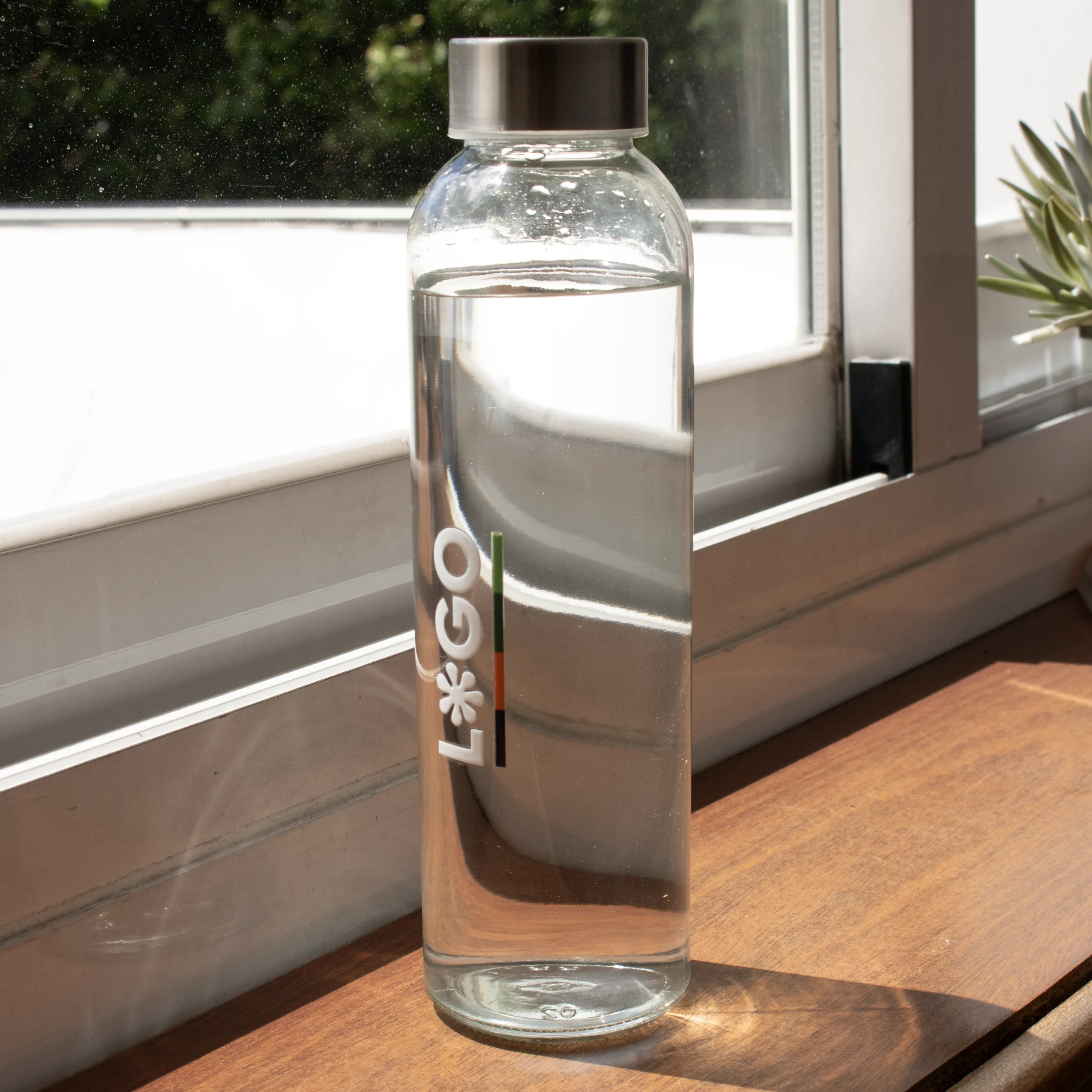 Botella de cristal personalizada ventana al sol