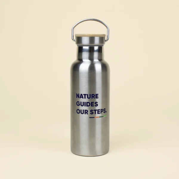 Botella térmica 500 ml personalizada texto azul fondo beige