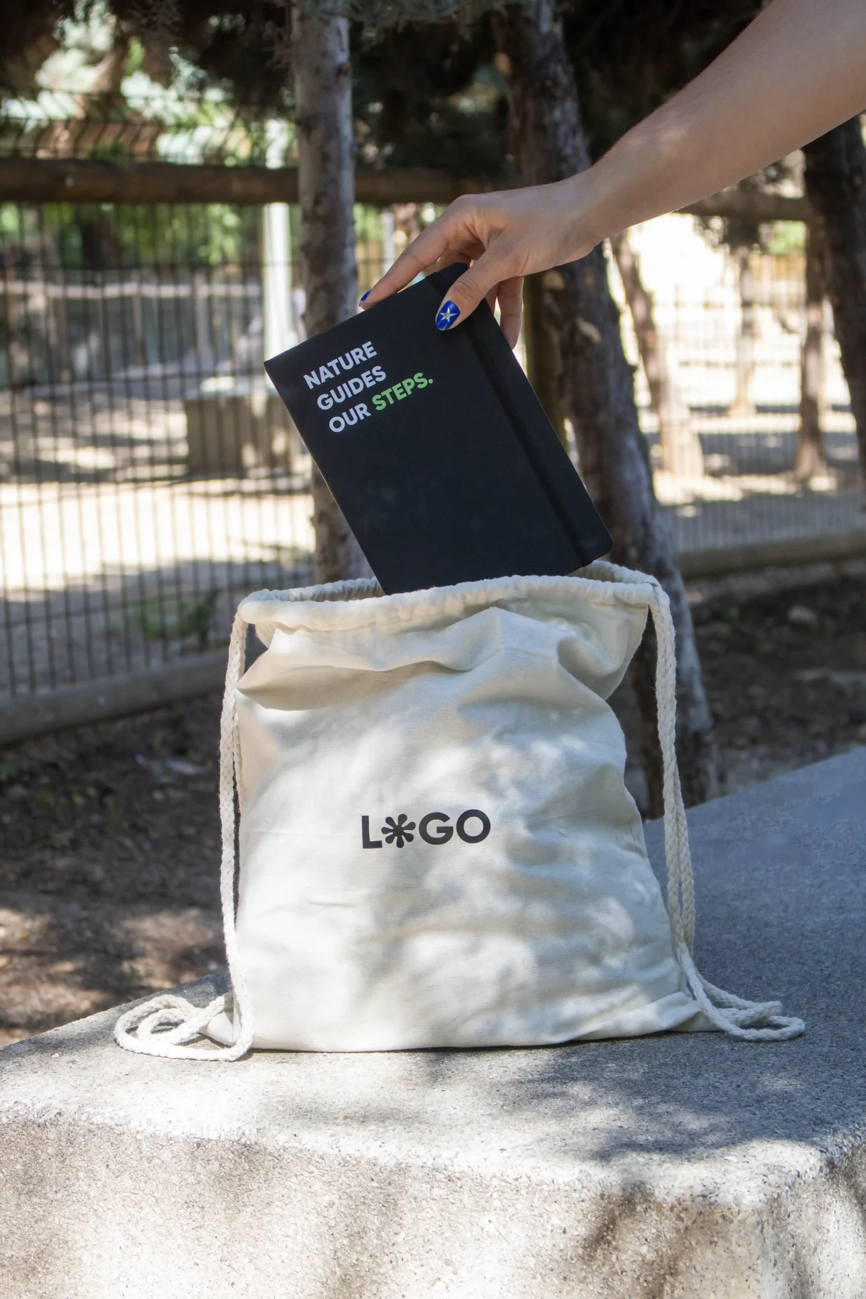 Rope bag LACCI + FLEX Custom beige rope bag with black logo and black notebook