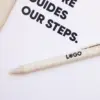 bolígrafo de caña de trigo blanco personalizado con logo y cuaderno blanco