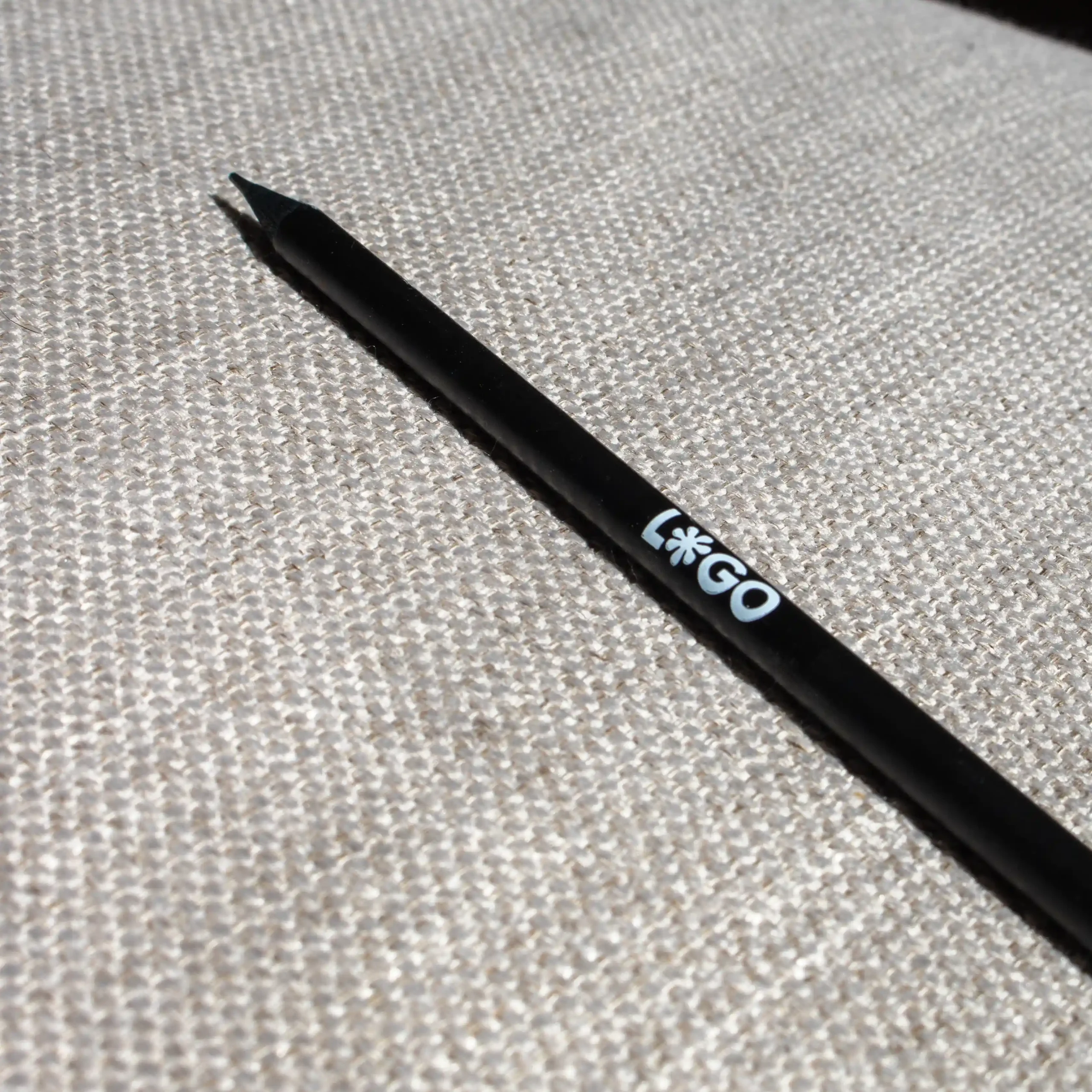 Promotional wooden pencil BRUNO black wooden pencil, custom-made with white logo