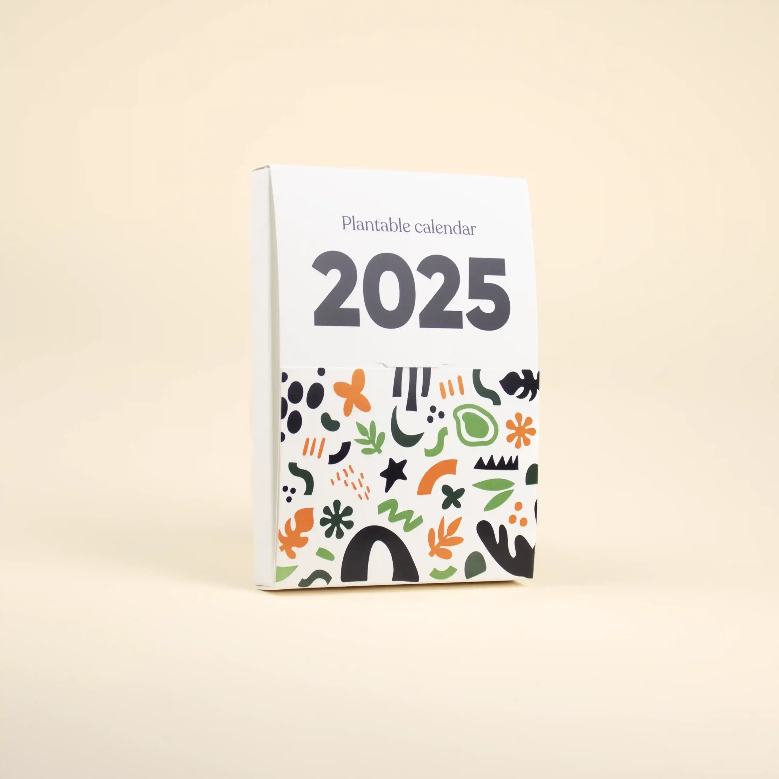 Portada 2025 de un calendario de semillas en estuche blanco personalizado