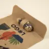 Cápsula biodegradable con semillas en su interior con packaging de cartón kraft personalizado