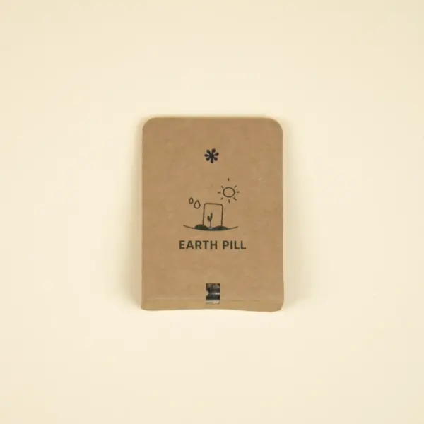 Cápsula biodegradable con semillas en su interior con packaging de cartón kraft personalizado