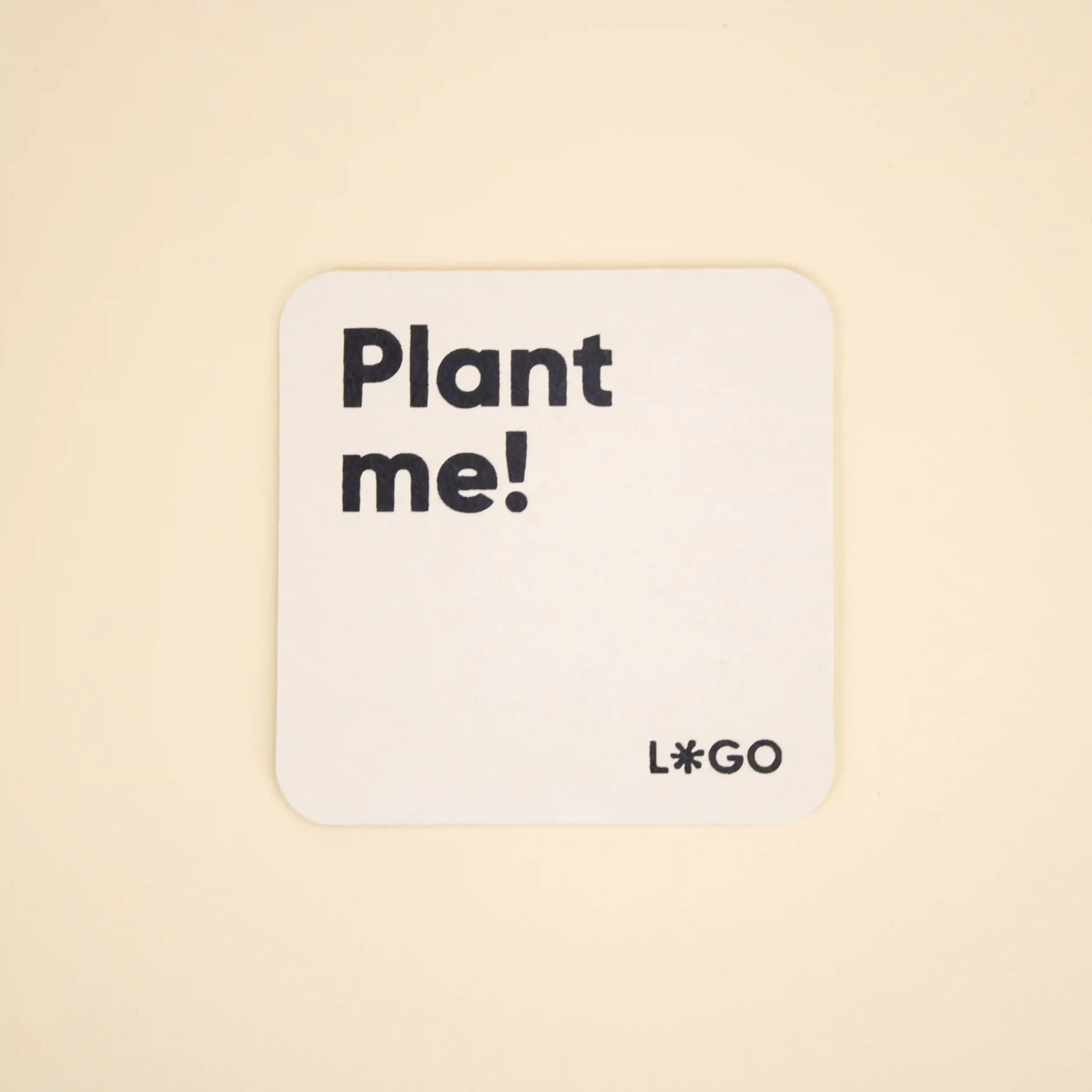 Posavasos de cartón MOK Posavasos de cartón personalizado con el texto 'plant me' y 'logo' en color azil