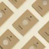 jabones artesanales dentro de cajas kraft marrones personalizadas