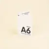 Tarjeta díptico A6 en papel plantable impresa en la cara exterior y en la cara interior