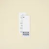 Dos marcapáginas de papel plantable personalizados colocados uno encima del otro