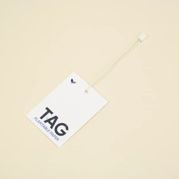Etiqueta impresa en papel plantable con un marchamo biodegradable blanco