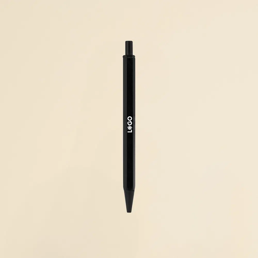 Bolígrafo de aluminio negro sobre un fondo beige