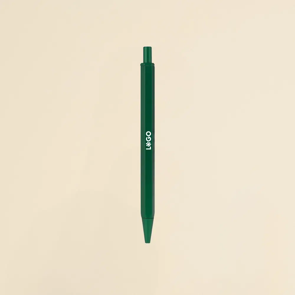Bolígrafo de aluminio verde sobre un fondo beige