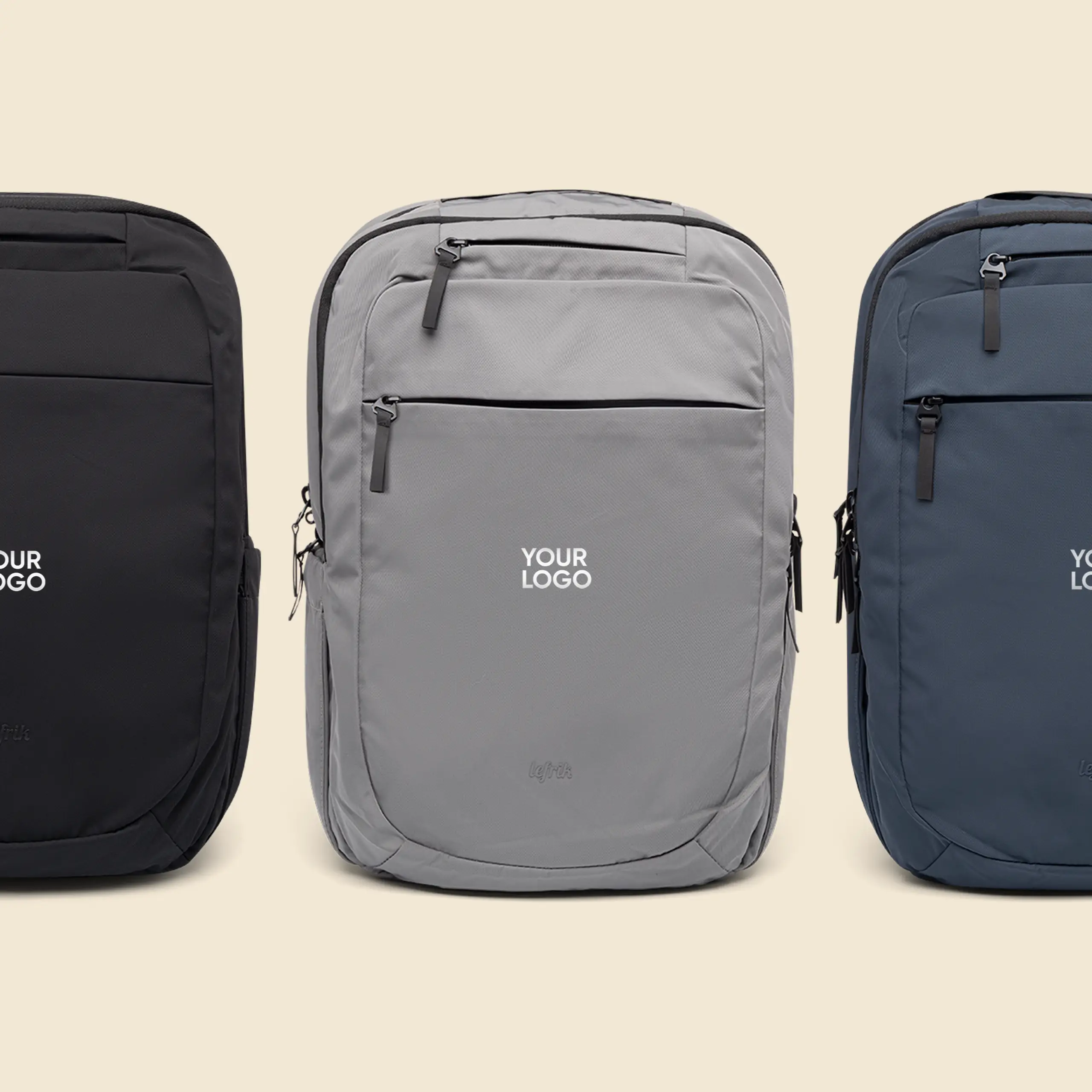 3 mochilas (negra, gris y azul marino) de la marca Lefrik personalizada con el texto "YOUR LOGO" en blanco