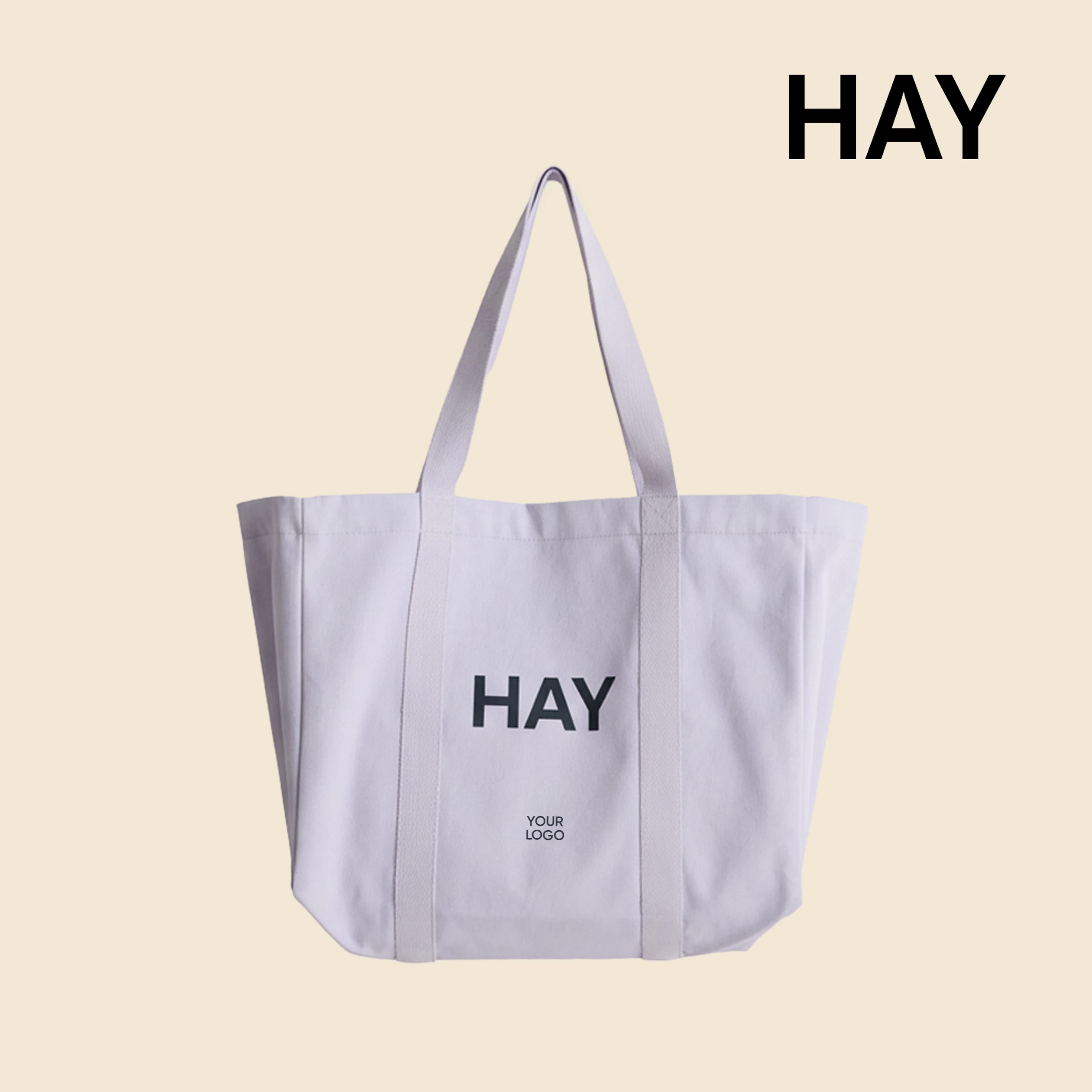 Bolsa de diseño de la marca HAY con impresión a todo color y a una tinta. De color lila.
