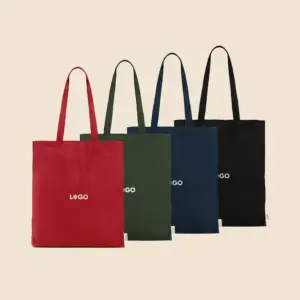 Bolsa de algodón reciclado de color negro, rojo , azul oscuro y verde con la palabra LOGO en blanco