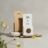 2 bombas de semillas plantables en un packaging de cartón personalizado (kraft y blanco)