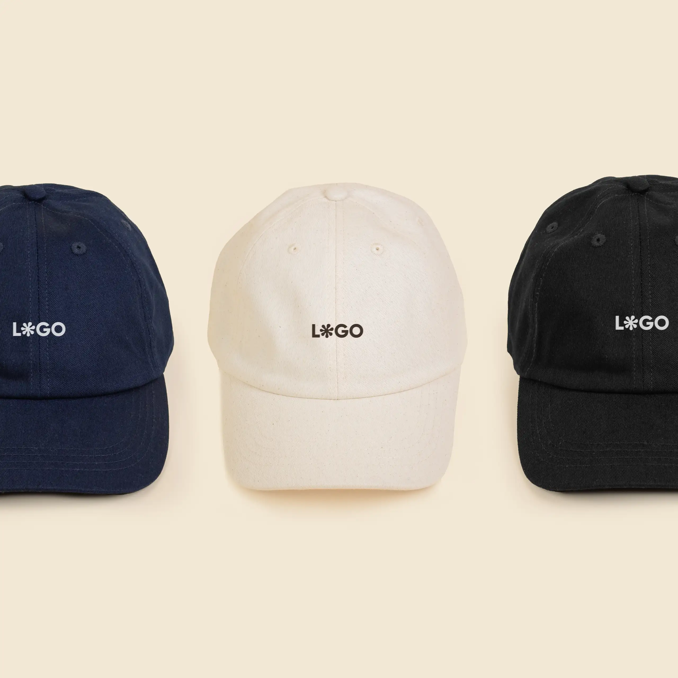 Gorra ecológica algodón orgánico GORKA 3 gorras ecológicas de algodón de color azul marino, beige y negro personalizadas con la palabra 'logo'