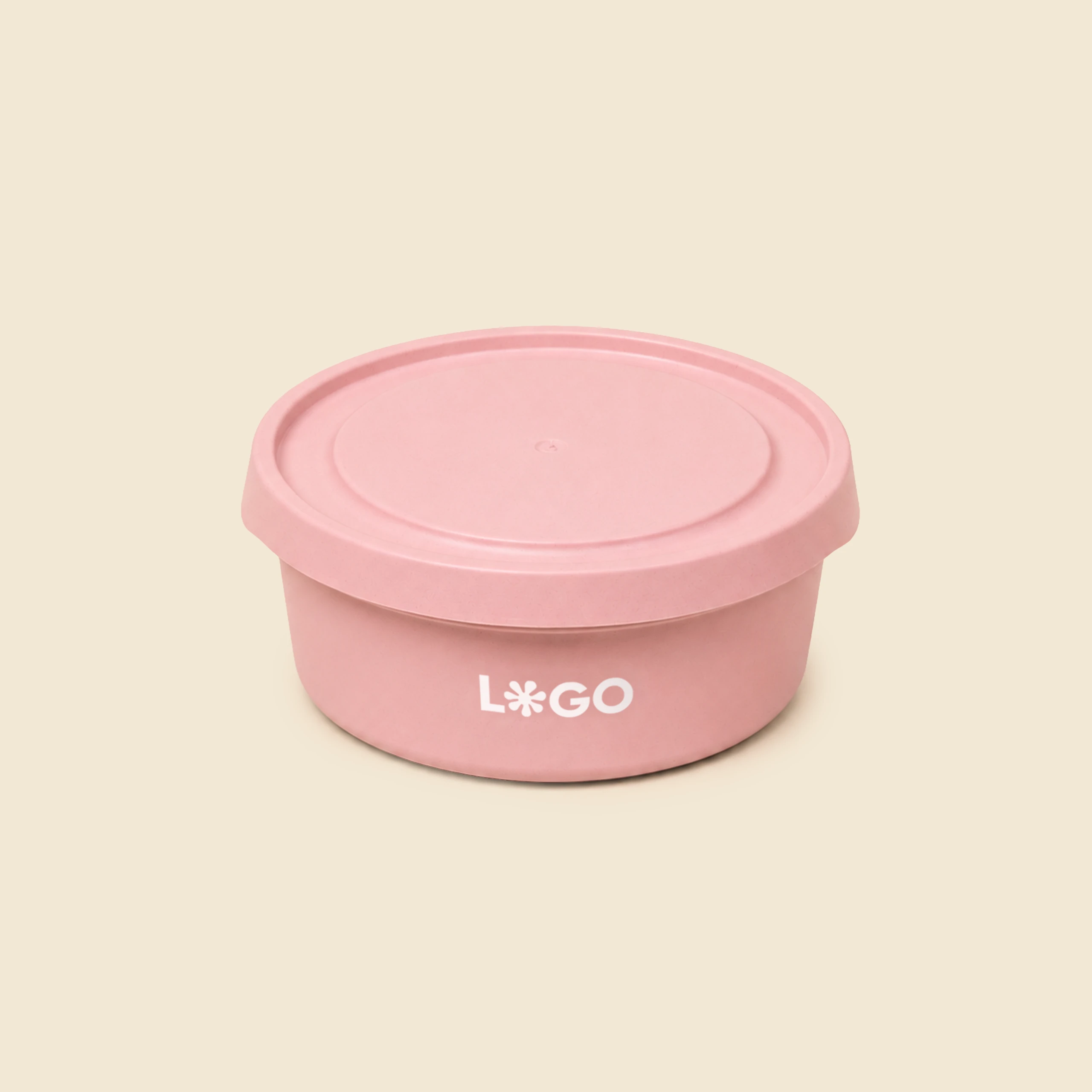 Tupper personalizado ecológico rosa con la palabra LOGO en blanco a una tinta.