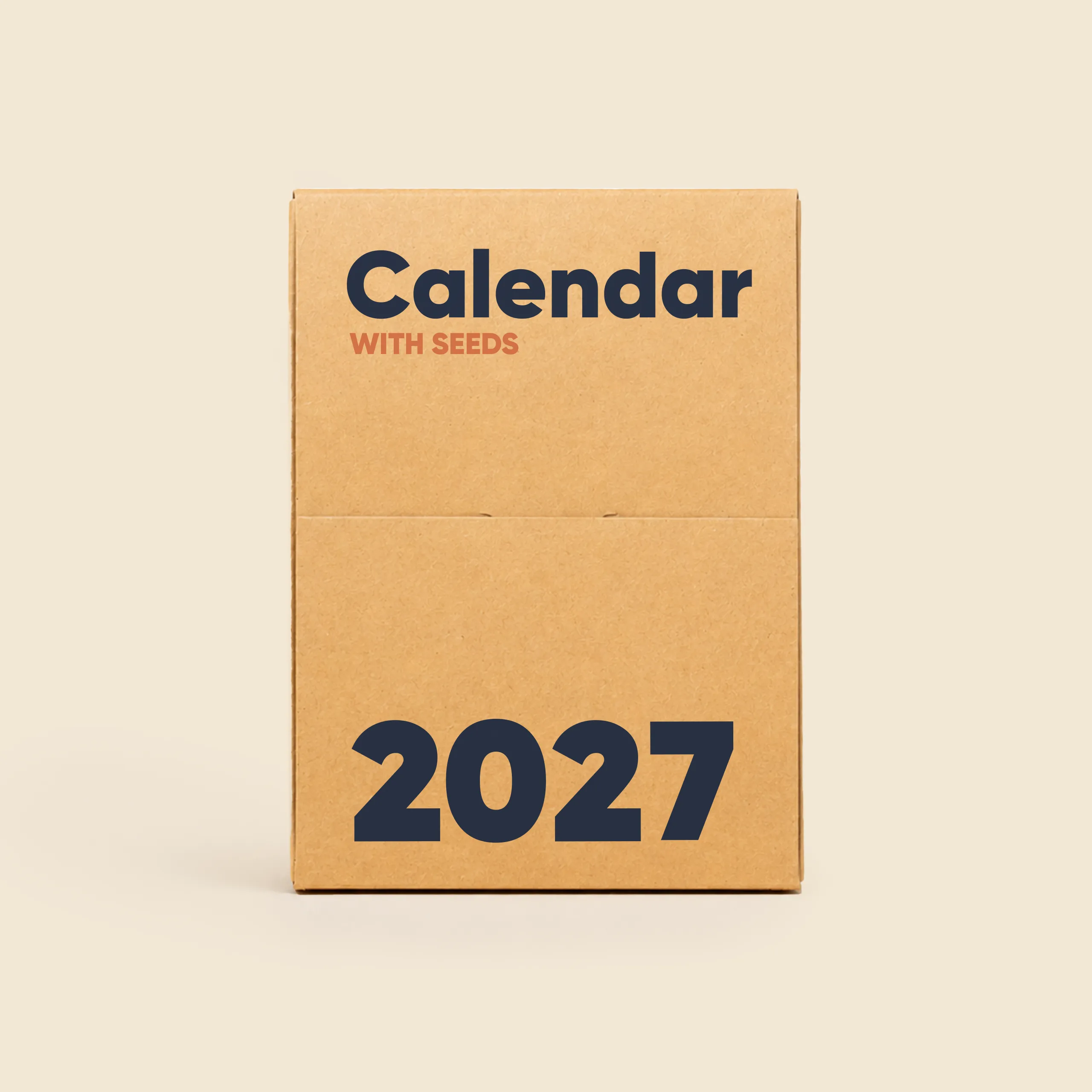 Seed calendar in a slipcase BOXE Kraft cardboard case in a vertical box format, showing the cover with the text "Calendar With Seeds 2027" in navy blue and orange typography on a kraft background.