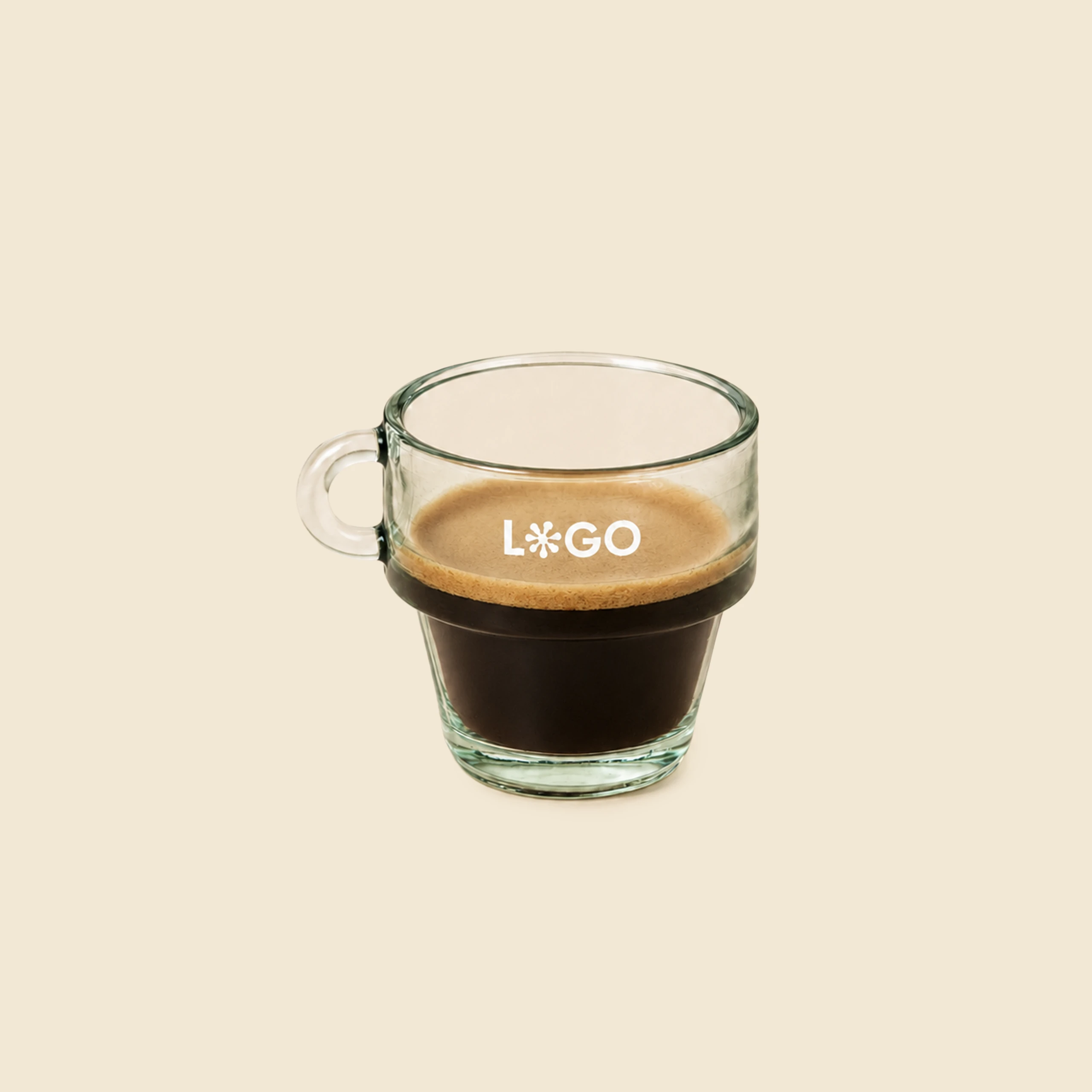 Small recycled glass cup with handle, custom-printed with logo, filled with espresso coffee on a beige background.